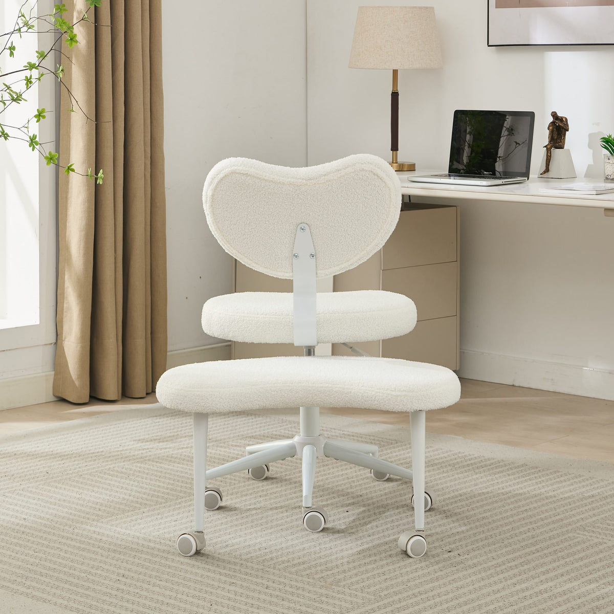 Ivory cross-legged meditation chair with wheels by Anthony & Home, featuring a comfortable padded seat and sturdy frame for relaxation.