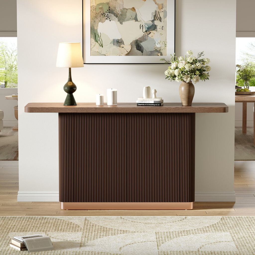 Anthony & Home console table with ash veneer top, fluted base, and metal accents from the Studio Collection.