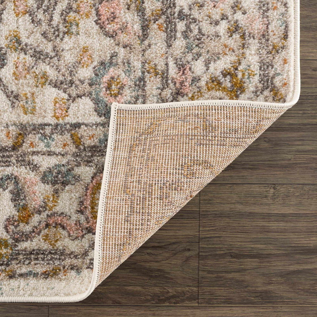 Folded Herstmonceux area rug by Boutique Rugs, showcasing a detailed, textured design in soft, neutral tones suitable for living spaces.