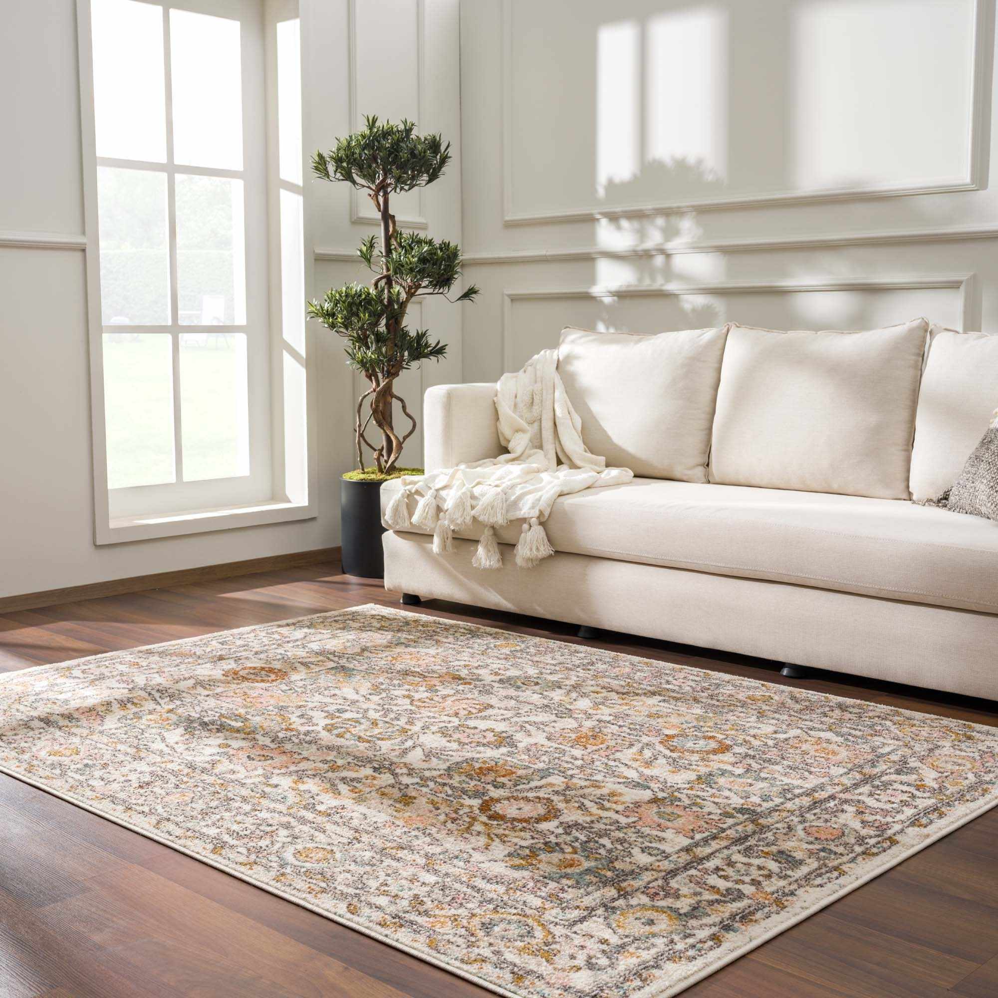 Herstmonceux area rug by Boutique Rugs displayed in a cozy room setting, showcasing its intricate patterns and soft texture.