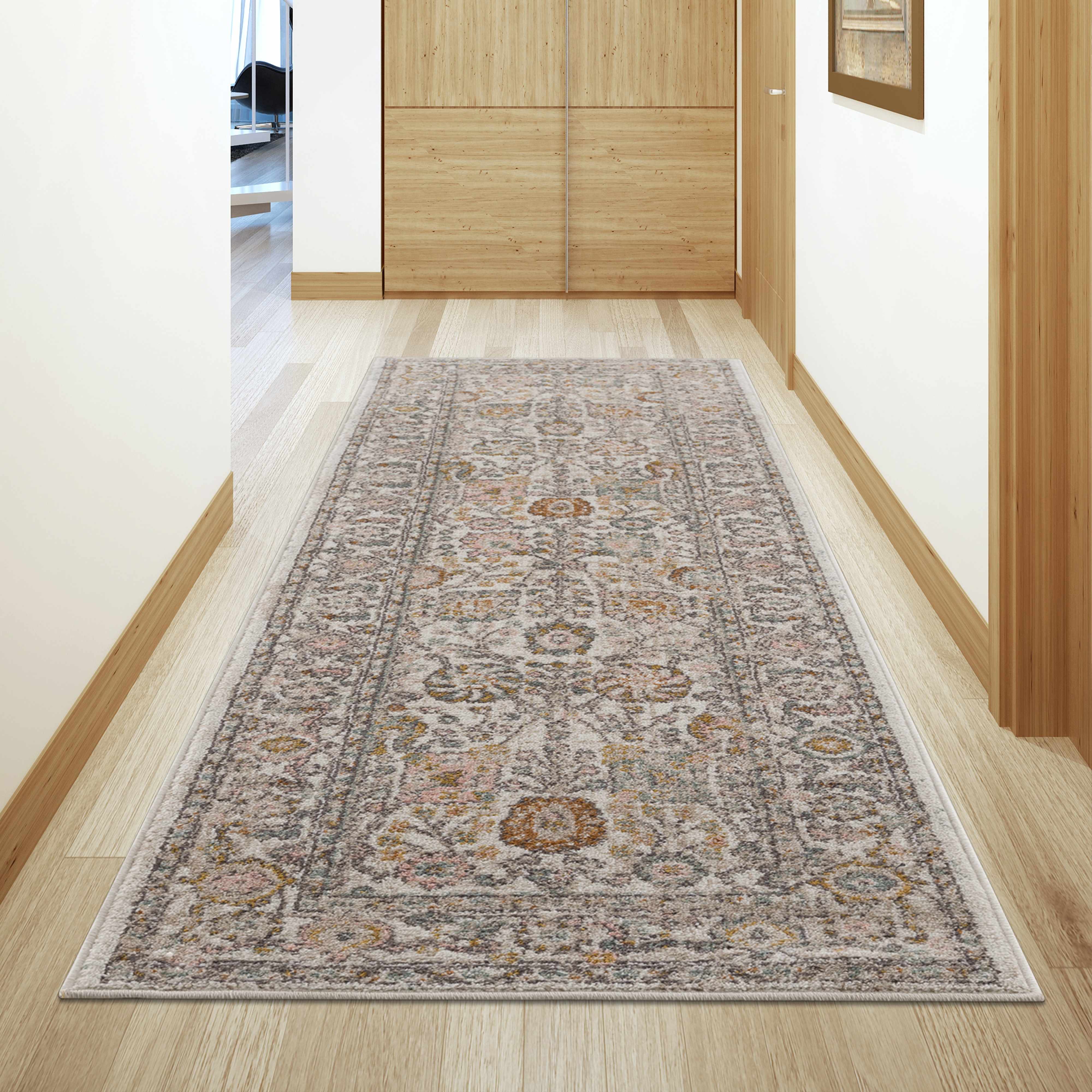 Herstmonceux area rug by Boutique Rugs displayed in a cozy living room setting, showcasing its intricate pattern and soft texture.