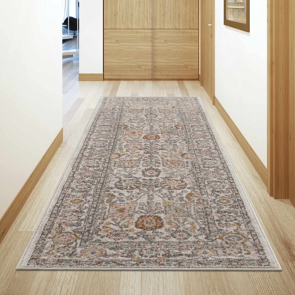 Herstmonceux area rug by Boutique Rugs displayed in a cozy living room setting, showcasing its intricate pattern and soft texture.