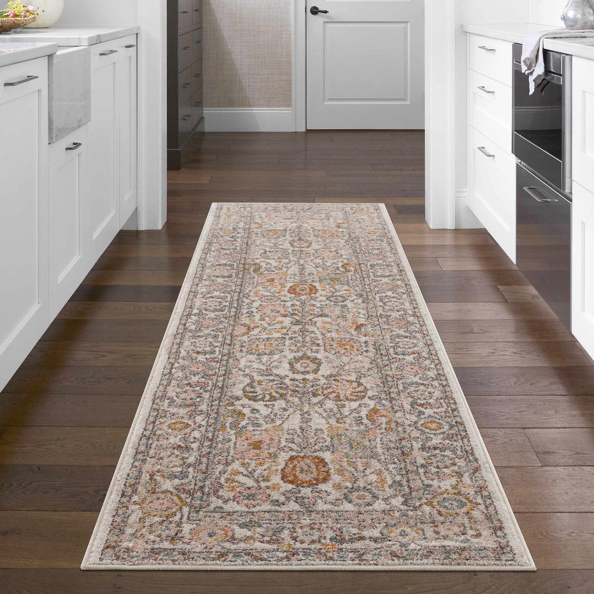 Herstmonceux area rug by Boutique Rugs, featuring a stylish pattern, shown in a cozy room setting with furniture and decor.