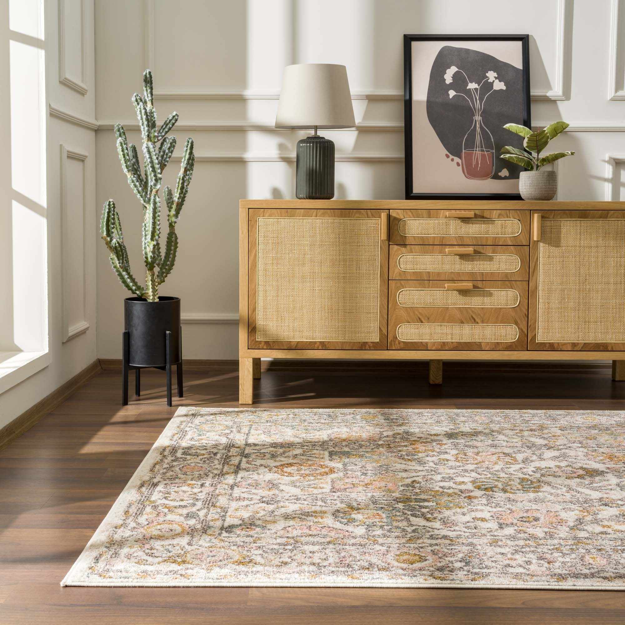 Herstmonceux area rug by Boutique Rugs displayed in a cozy living room setting with intricate patterns and warm tones.