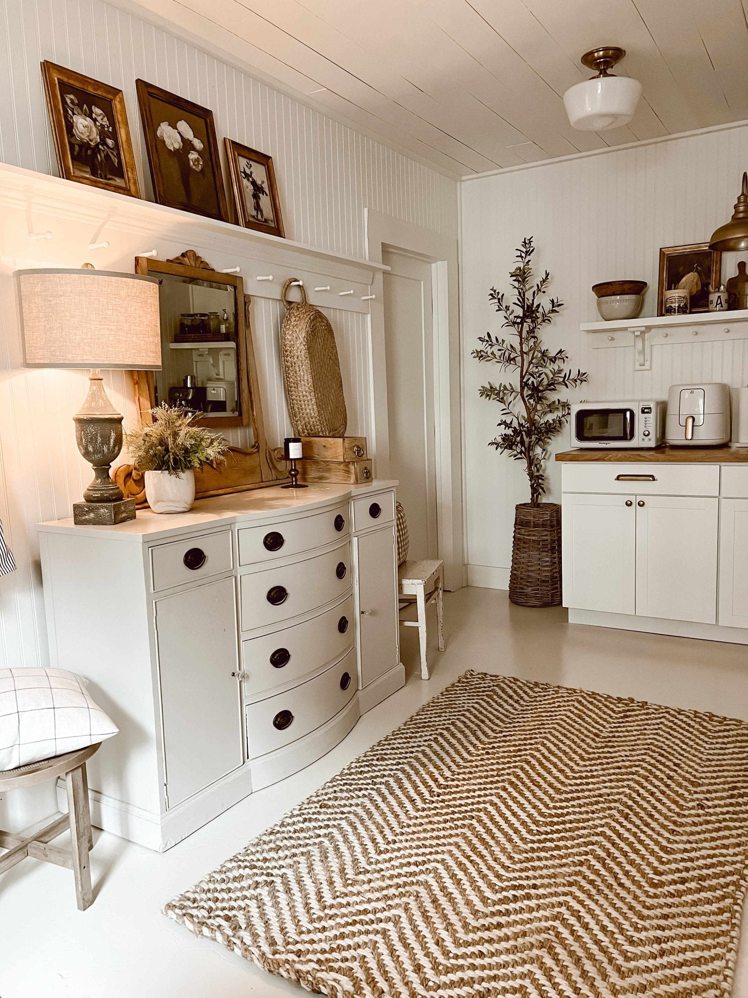 Hand-woven jute area rug featuring natural earthy tones from Boutique Rugs' Aren collection, designed by Ashley Knie.