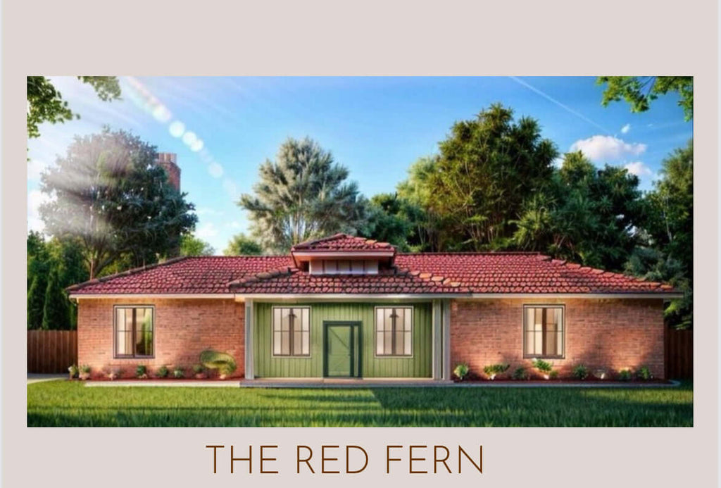 The Red Fern house plan bundle featuring a charming brick home with a green accent door surrounded by trees.