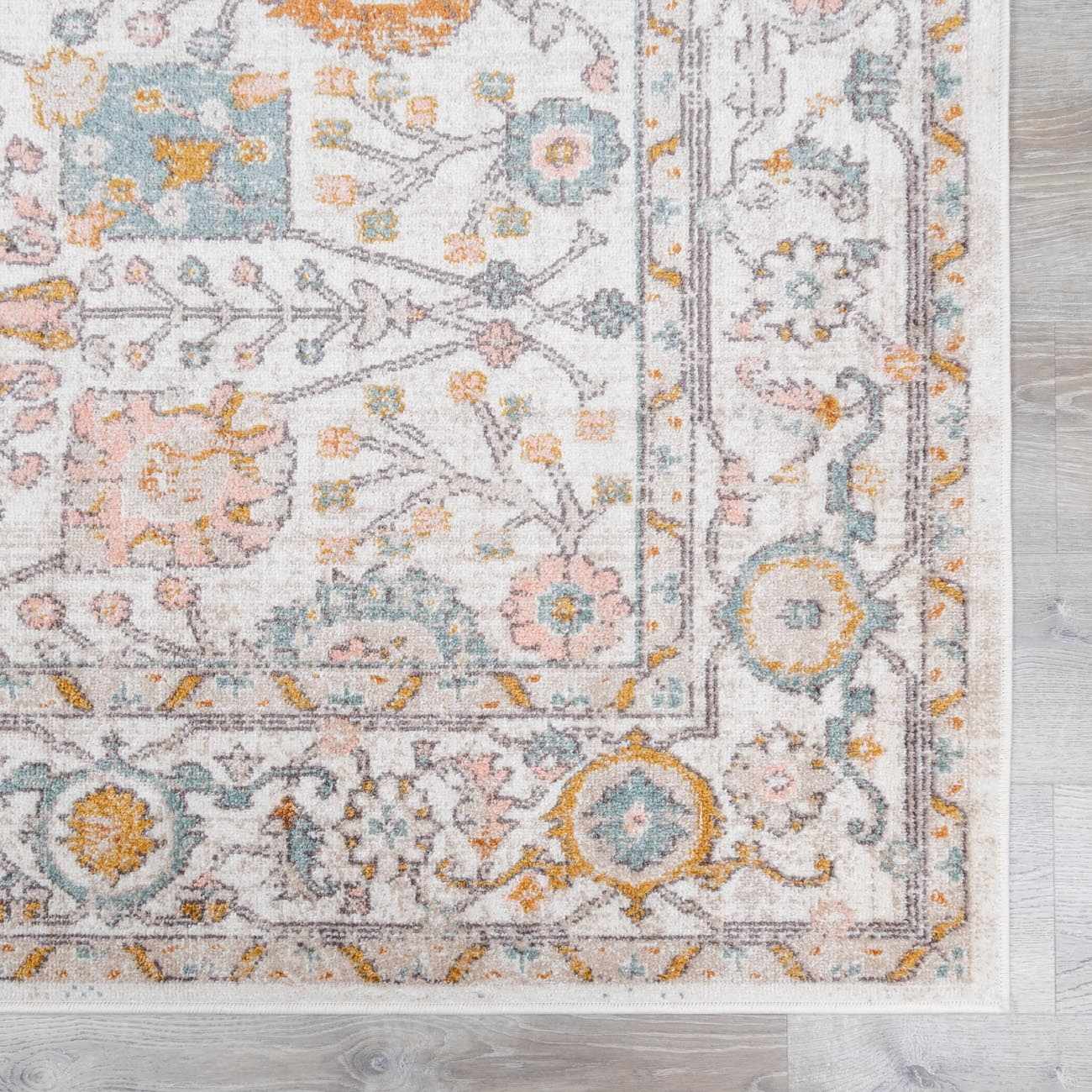 Swatch of Herstmonceux Area Rug by Boutique Rugs, showcasing a textured, multicolored rug sample with intricate patterns and soft fibers.