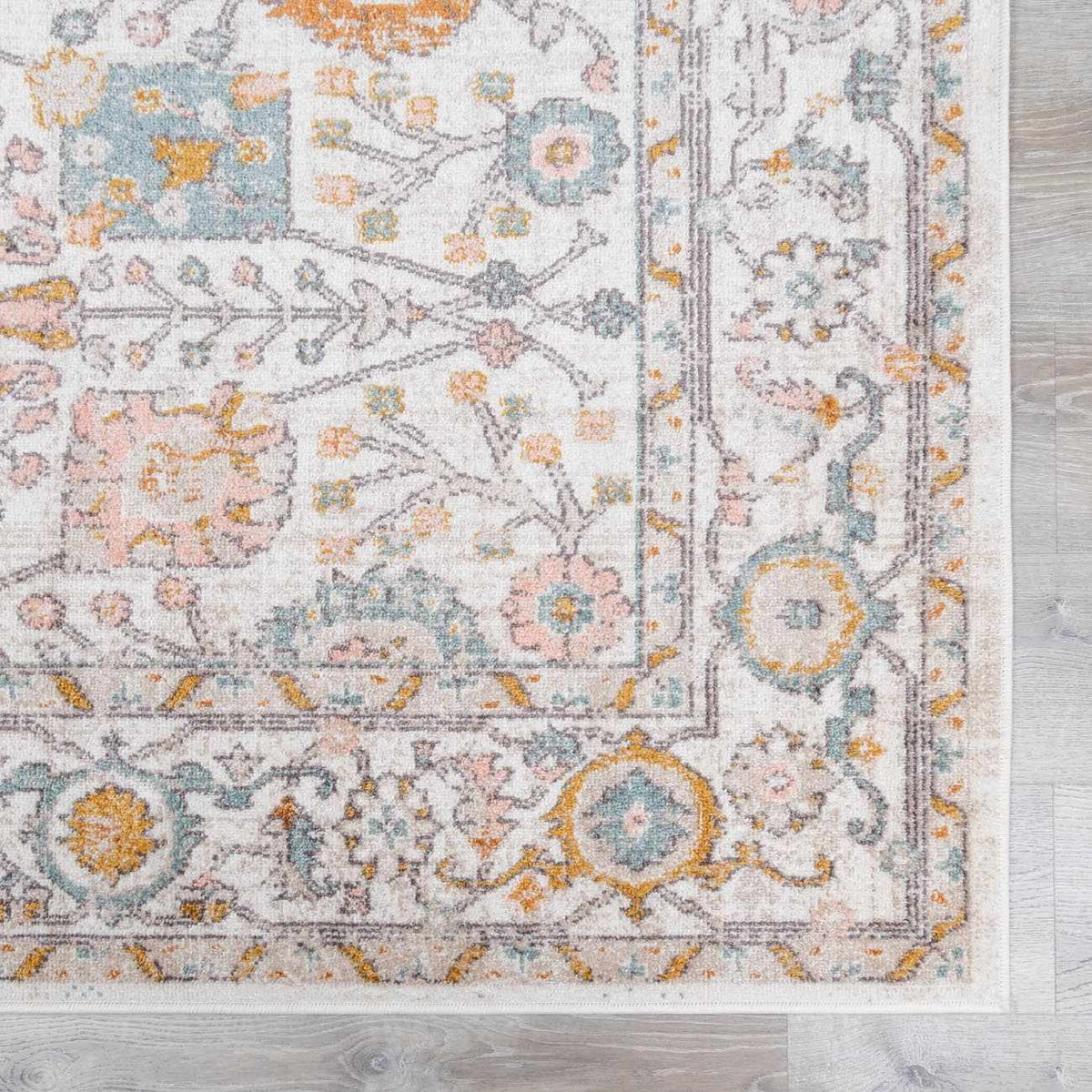 Swatch of Herstmonceux Area Rug by Boutique Rugs, showcasing a textured, multicolored rug sample with intricate patterns and soft fibers.