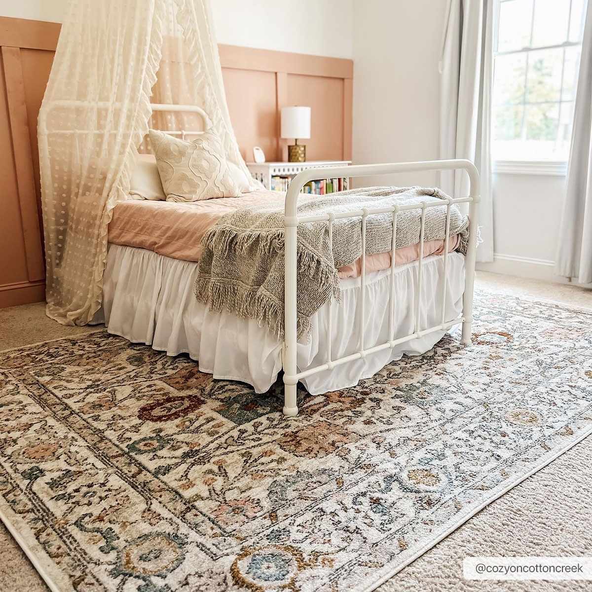 Herstmonceux area rug by Boutique Rugs displaying a 6x9 size with intricate patterns in earthy tones.