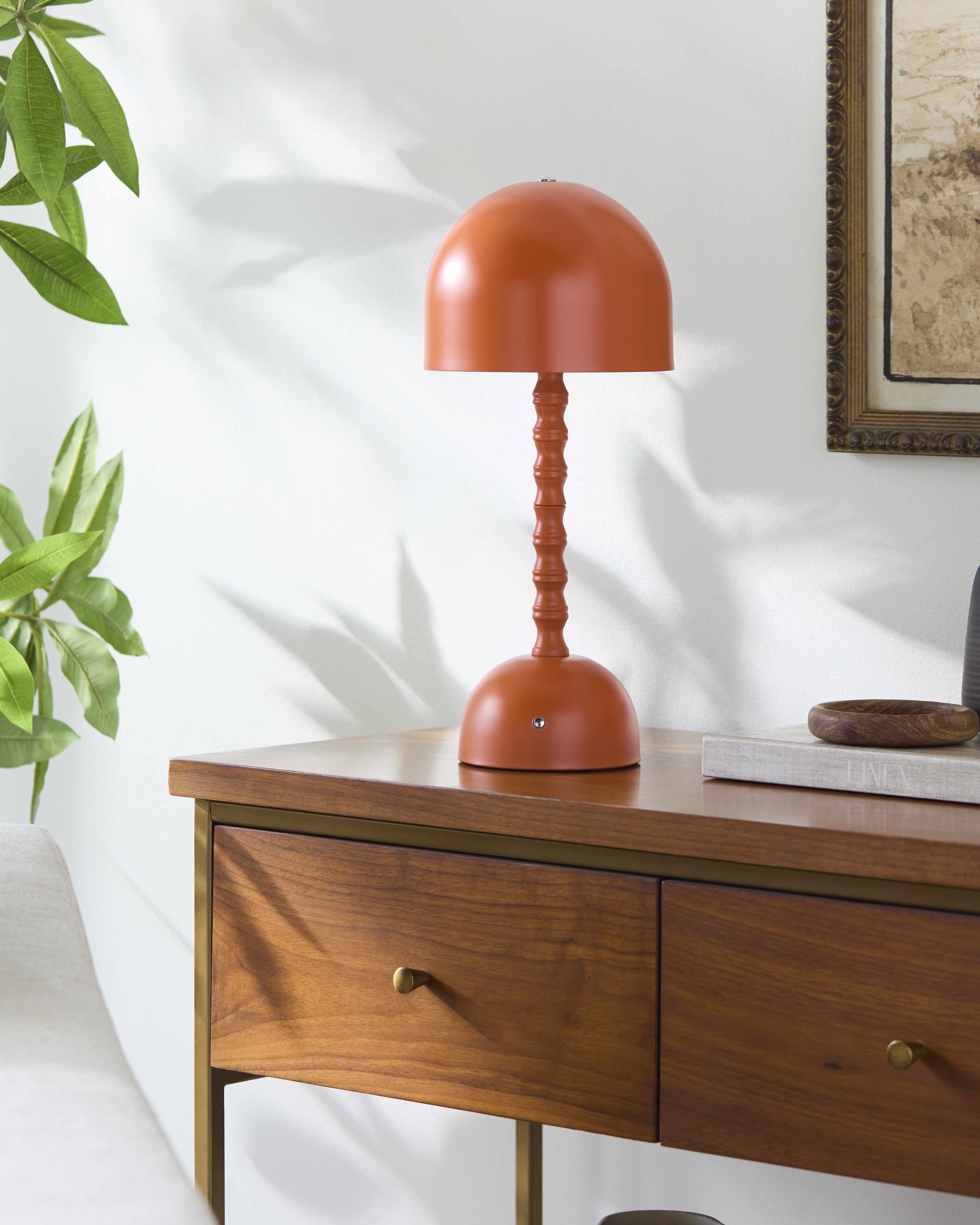 Orange Magdagachi table lamp by Boutique Rugs featuring a modern design and a sleek, vibrant base, perfect for stylish lighting.