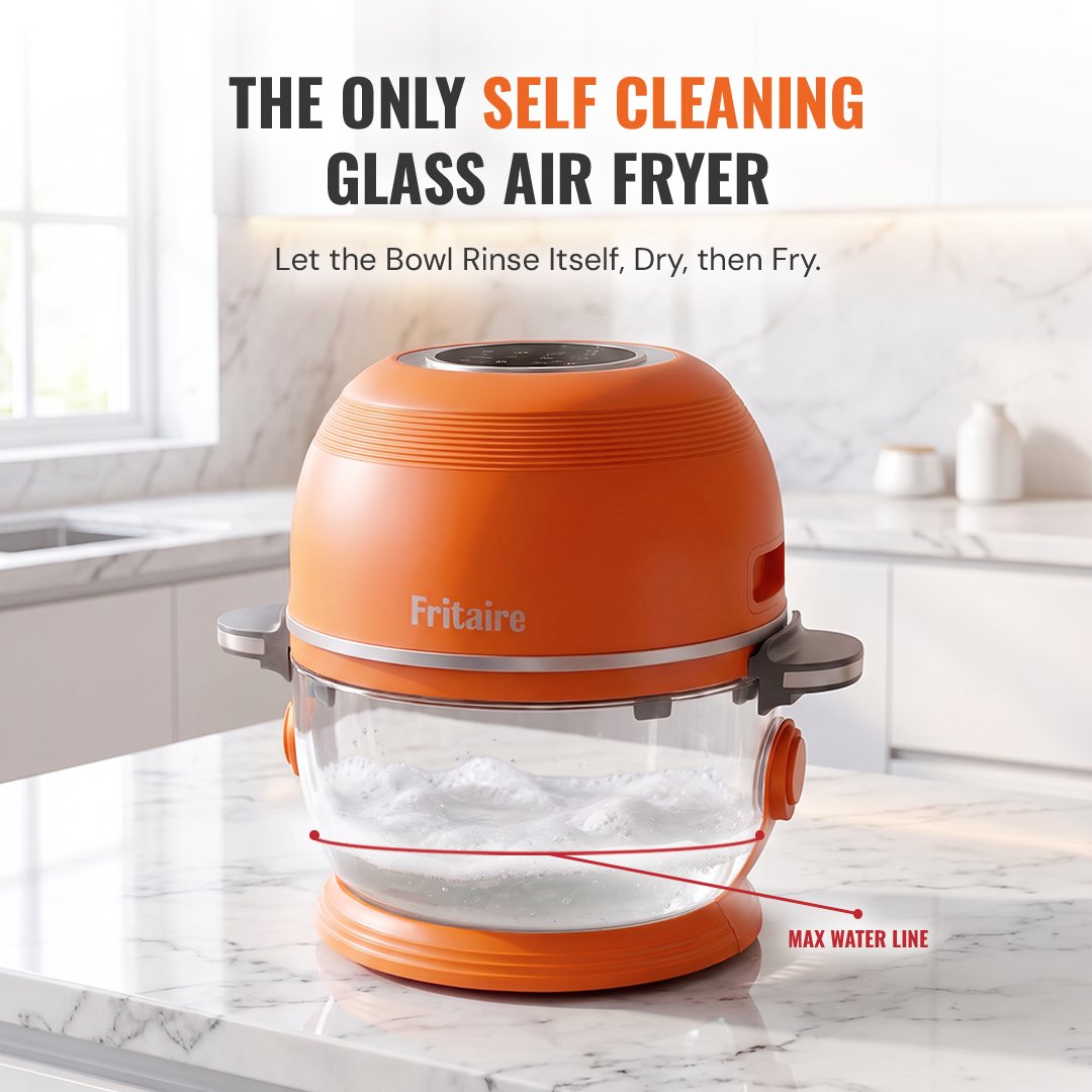 Fritaire Self-Cleaning Air Fryer in Mauve Rose with digital control panel and compact kitchen appliance design.
