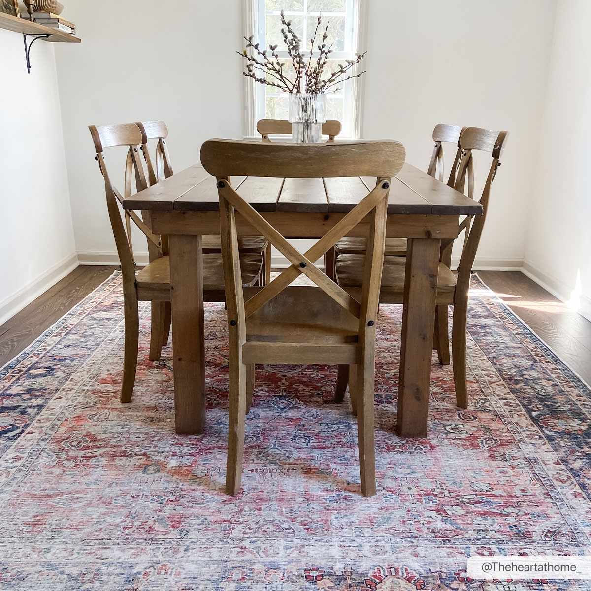 Rust-colored Anahawan distressed washable area rug by Hauteloom, featuring a heritage-inspired design and textured surface.