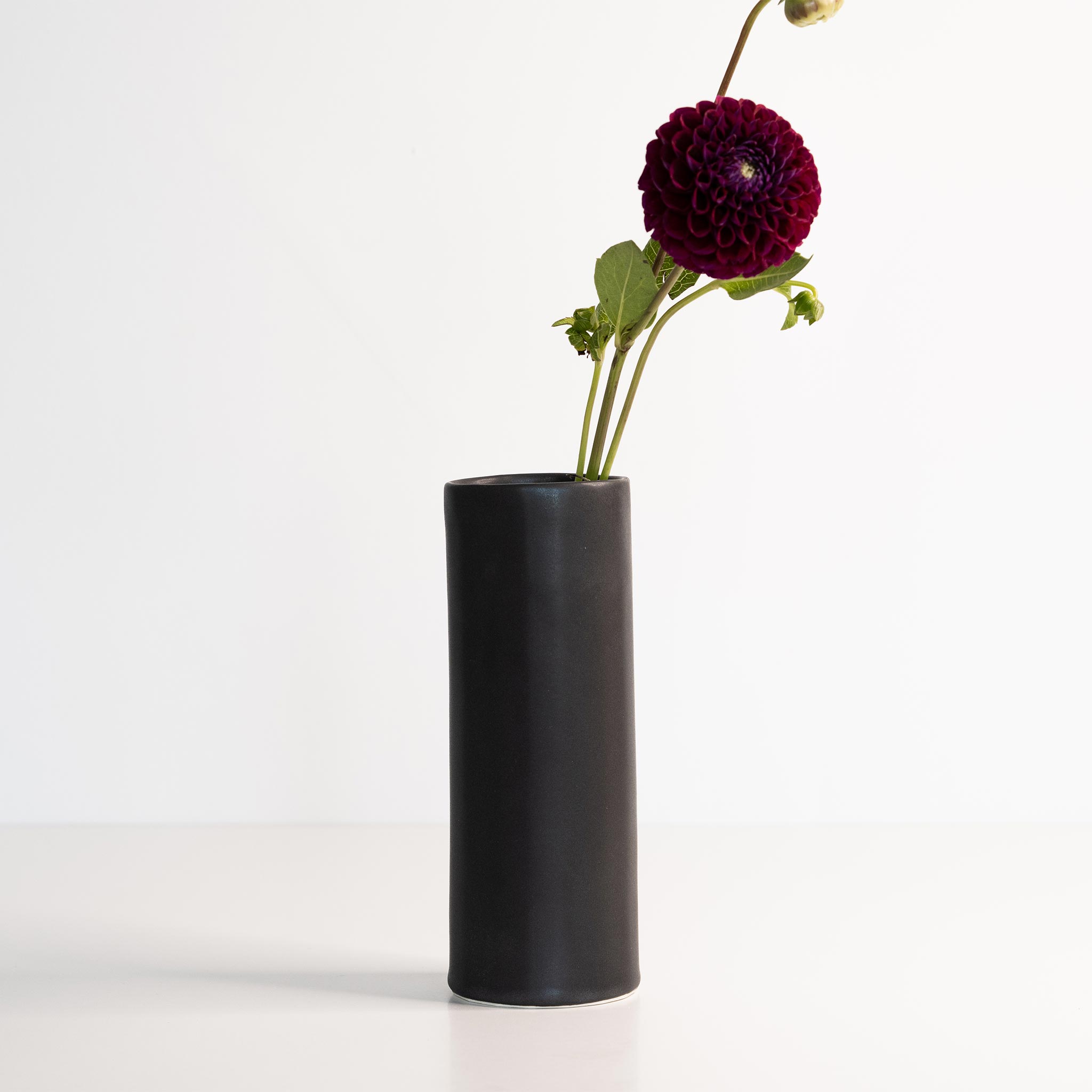 Handmade porcelain Bloom Vase by Ember Collective, featuring a sleek, minimalist design perfect for floral displays.