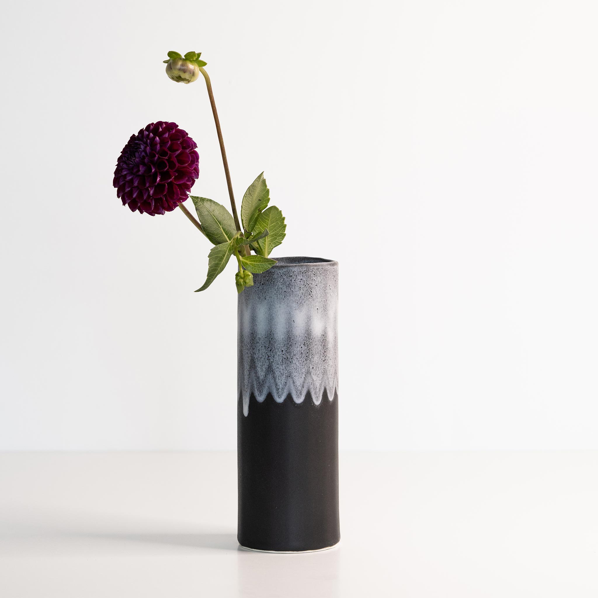 Handmade porcelain Bloom Vase by Ember Collective featuring a sleek, elegant design suitable for floral arrangements.