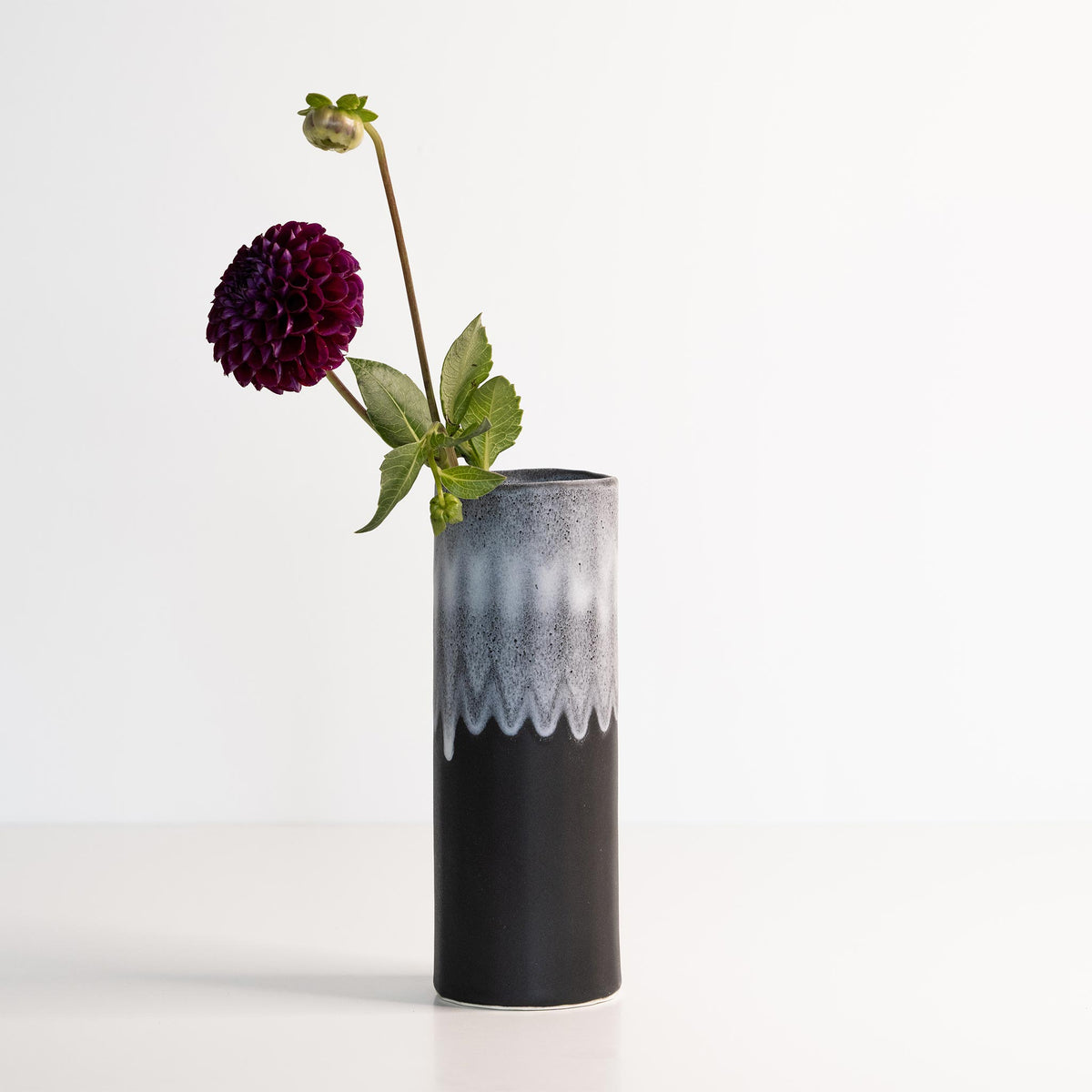 Handmade porcelain Bloom Vase by Ember Collective featuring a sleek, elegant design suitable for floral arrangements.