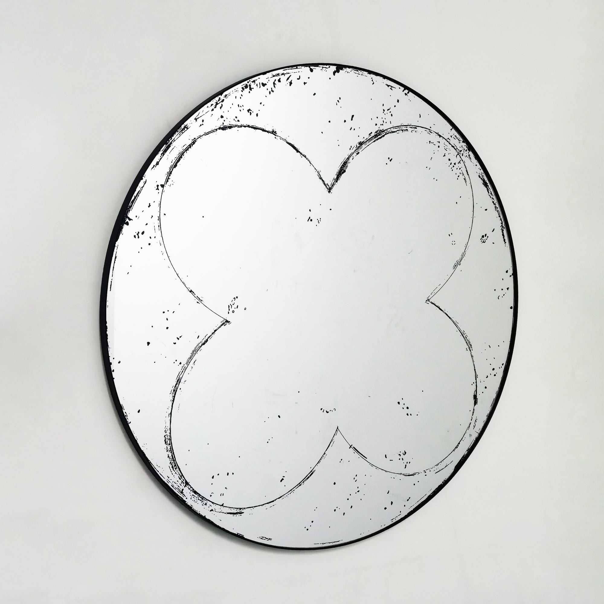 Brushed brass round wall mirror from Atelier collection by Anthony & Home, showcasing a sleek, modern design with a smooth circular frame.