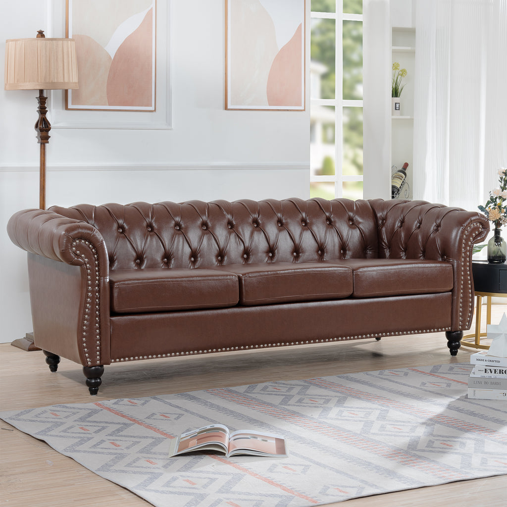 Anthony & Home Chesterfield Sofa with Birch Legs, featuring classic design and plush upholstery in a cozy living room setting.