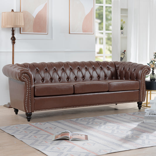 Anthony & Home Chesterfield Sofa with Birch Legs, featuring classic design and plush upholstery in a cozy living room setting.