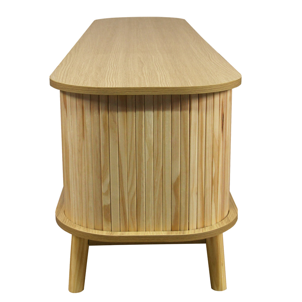 Anthony & Home rattan television console in a modern studio setting with open shelving and stylish design.