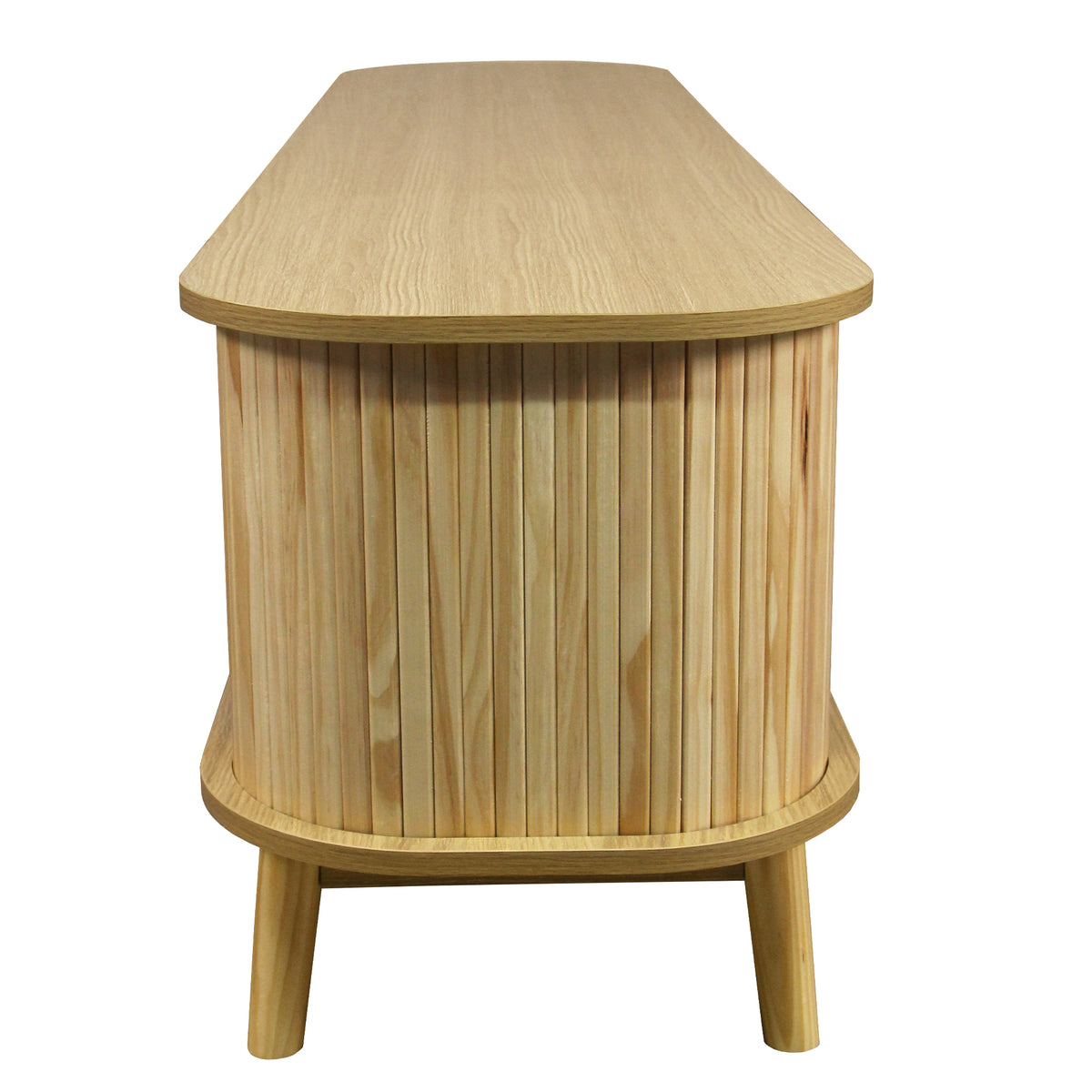Anthony & Home rattan television console in a modern studio setting with open shelving and stylish design.