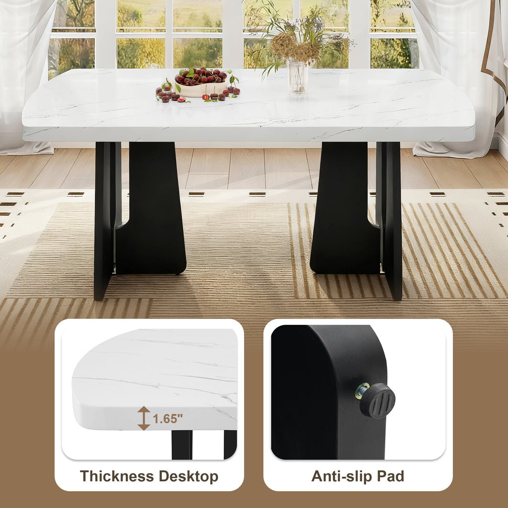 Anthony & Home Atelier faux marble dining table with black and white geometric legs, showcasing modern design and sleek surface.