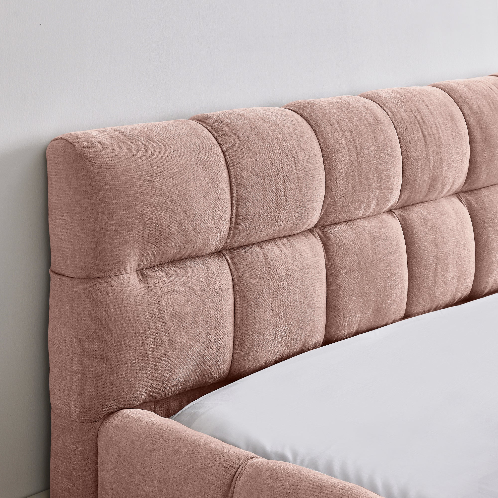 Pink upholstered queen bed frame from Anthony & Home's Limited Chenille Collection, no box spring needed, stylish and comfortable.