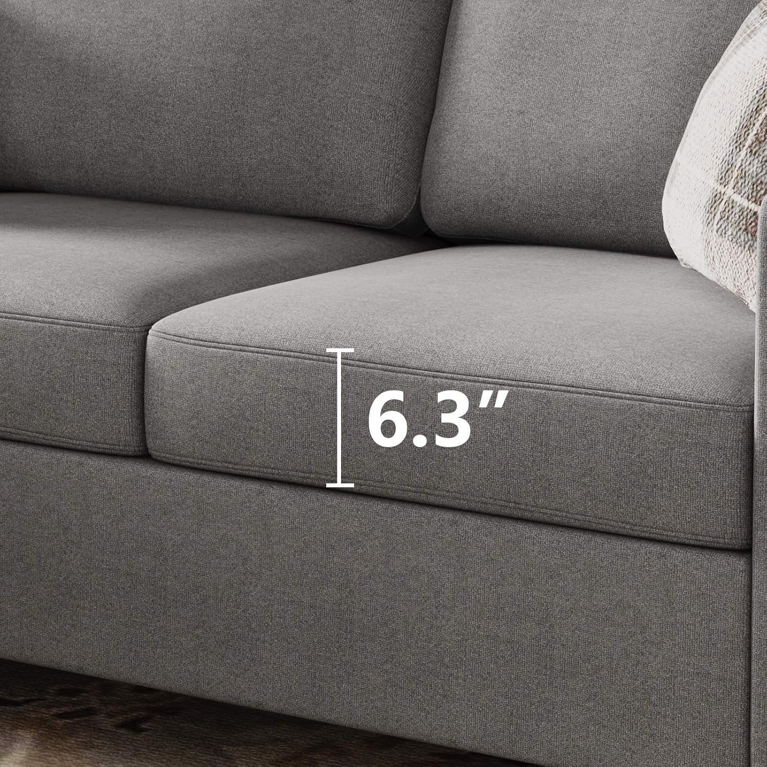 Grey L-shaped convertible sectional sofa with reversible chaise, designed for versatile seating and modern living spaces.