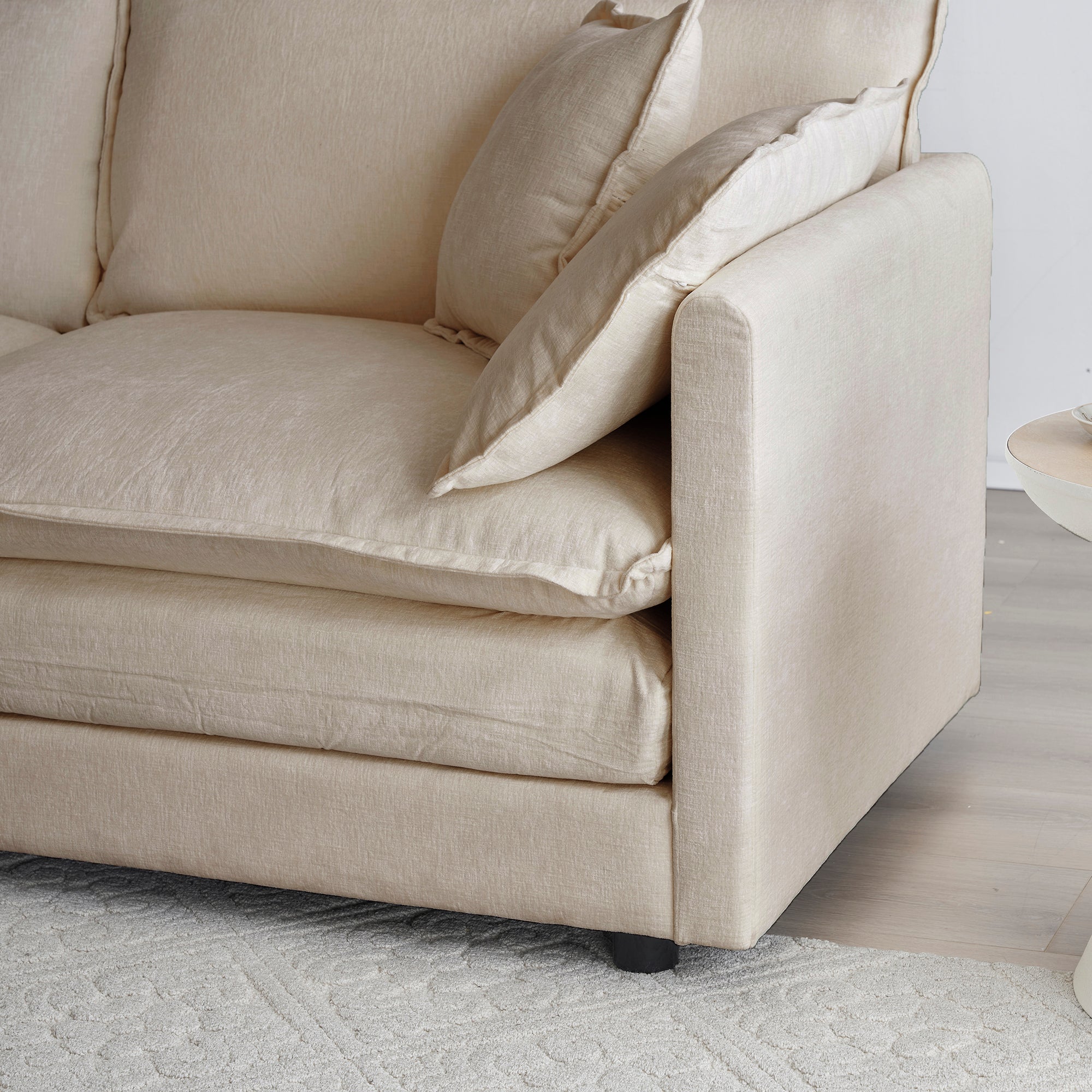 Beige Chenille Collection L-shaped sectional sofa by Anthony & Home with plush cushions and modern design.