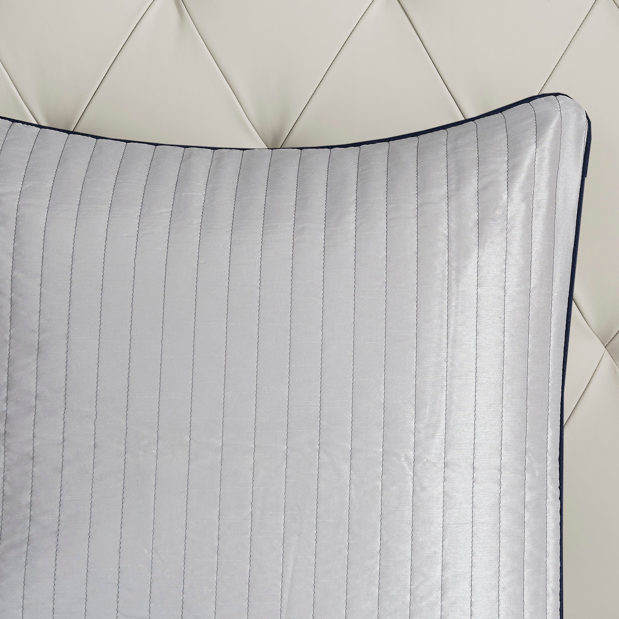Anthony & Home Aubrey Jacquard Navy King Comforter Set showing intricate woven pattern on soft fabric bedding.