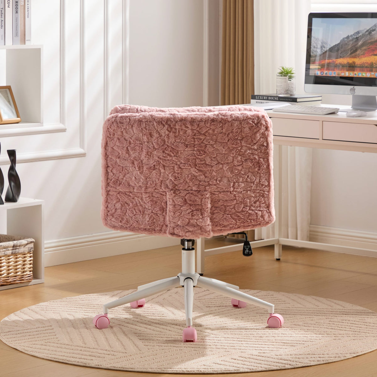Studio pink faux rabbit hair office chair with wide 26.4-inch seat and metal base, by Anthony & Home.