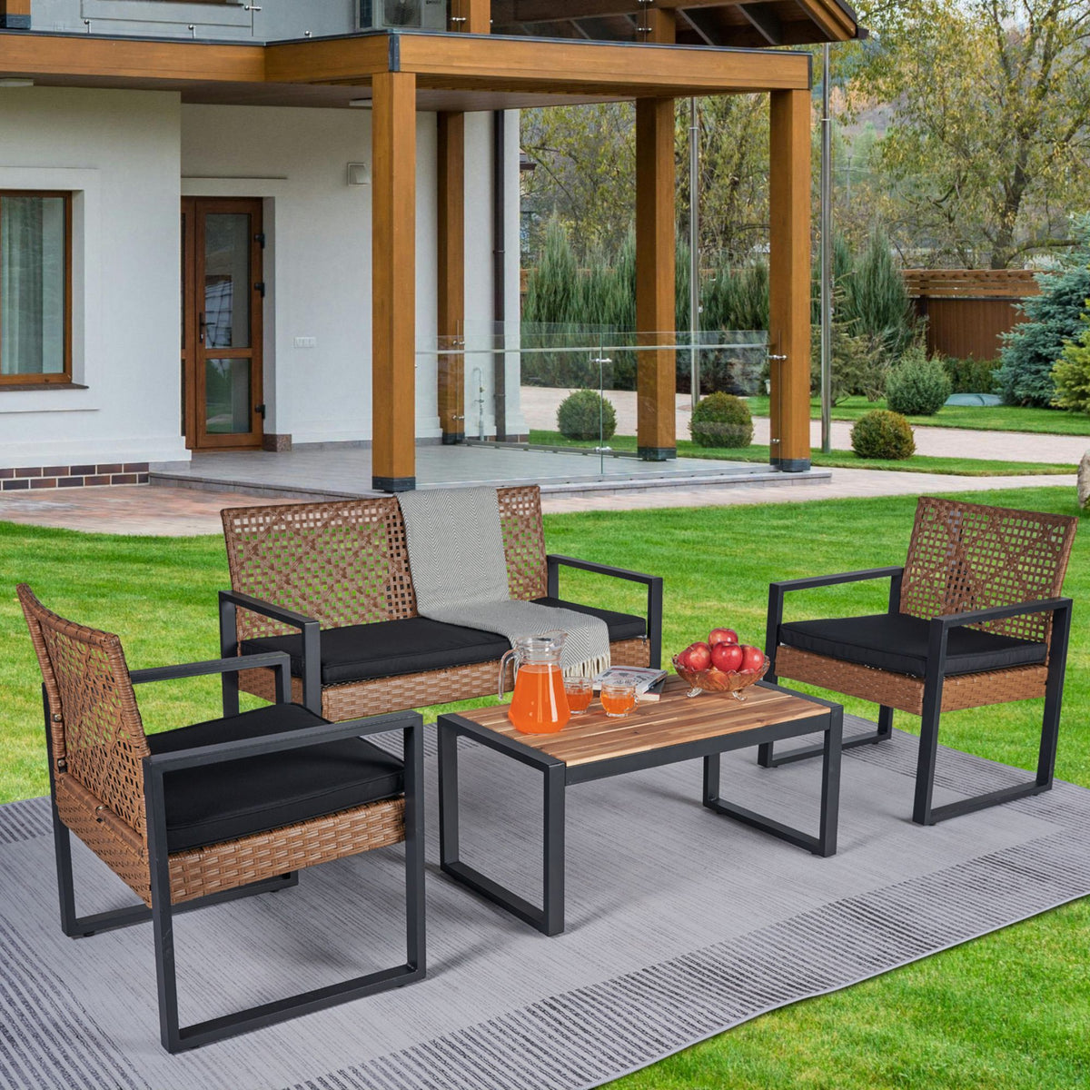 Acacia wood outdoor patio table and chairs set with four pieces, designed for a stylish and durable outdoor dining space.