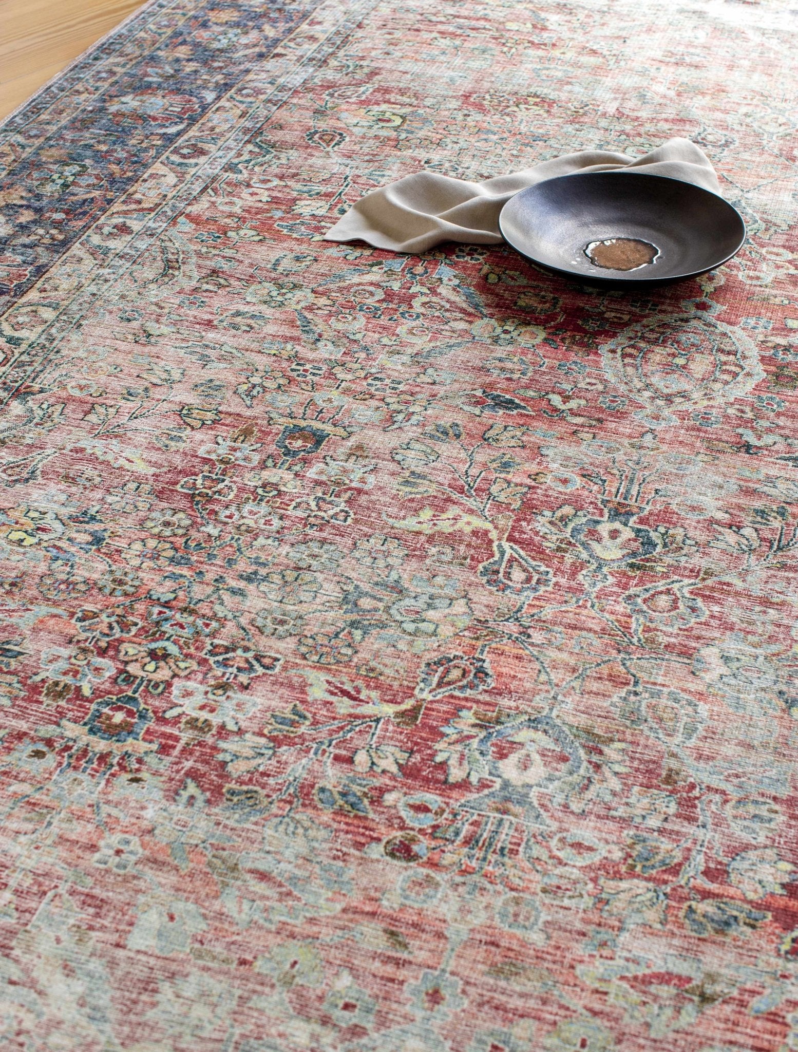 Hauteloom Anahawan Rust distressed washable area rug with heritage-inspired design, soft textured surface, and durable craftsmanship.