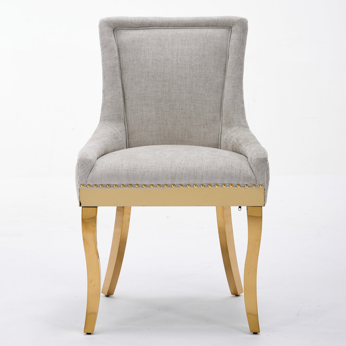 Beige chenille dining chairs with gold plated legs, showcasing a stylish and modern design from Anthony & Home.
