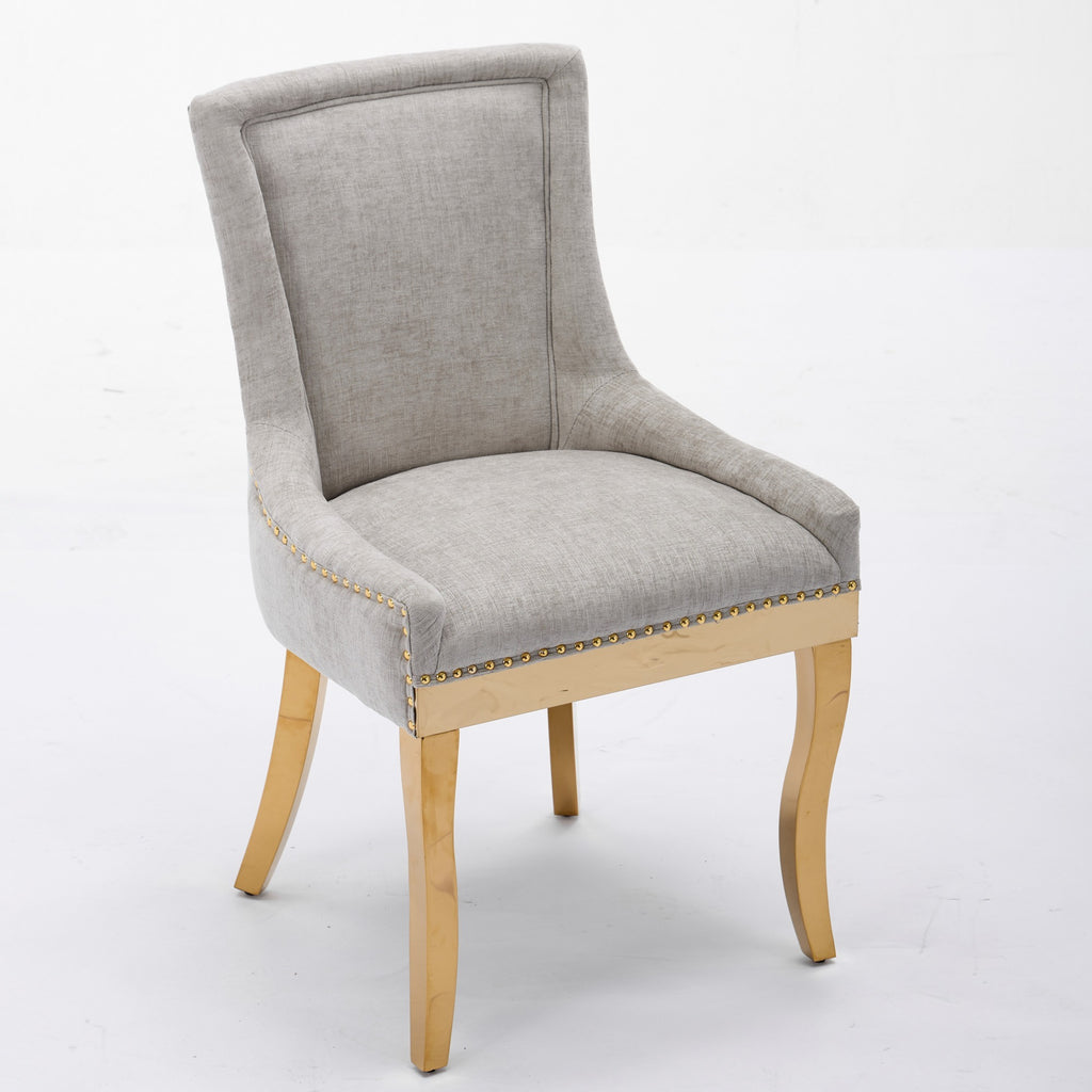 Beige chenille dining chairs with gold plated legs from Anthony & Home, showcasing plush upholstery and elegant design.