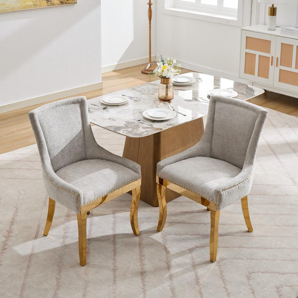 Beige chenille dining chair with gold-plated legs from Anthony & Home, shown with a stylish and comfortable upholstered seat.