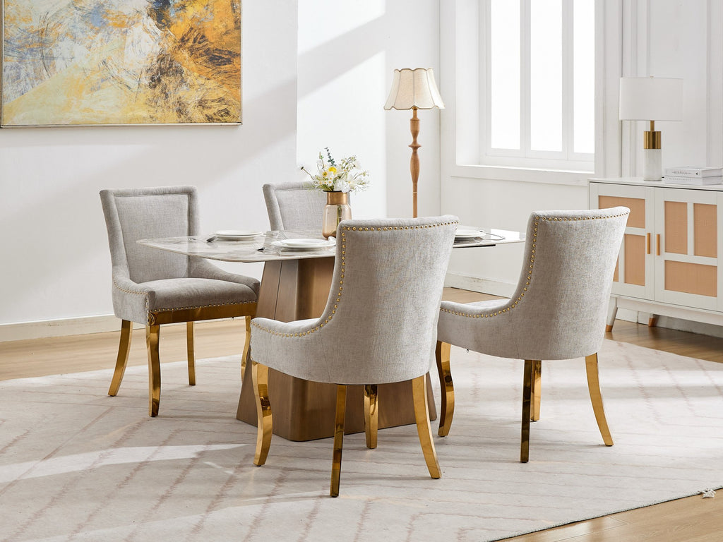 Beige chenille dining chairs with gold plated legs from Anthony & Home, modern and stylish for your dining room.