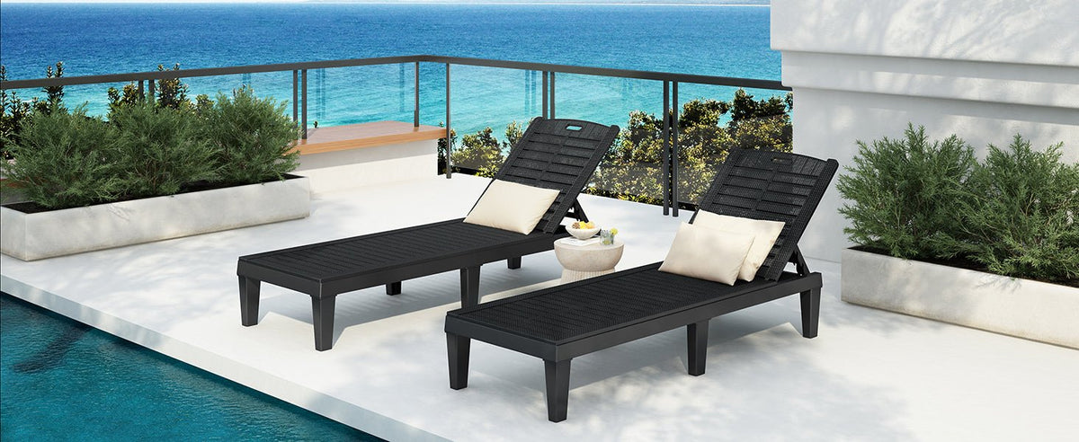 Pair of outdoor chaise lounge chairs with adjustable backs from Anthony & Home, featuring sleek design and comfortable cushions.