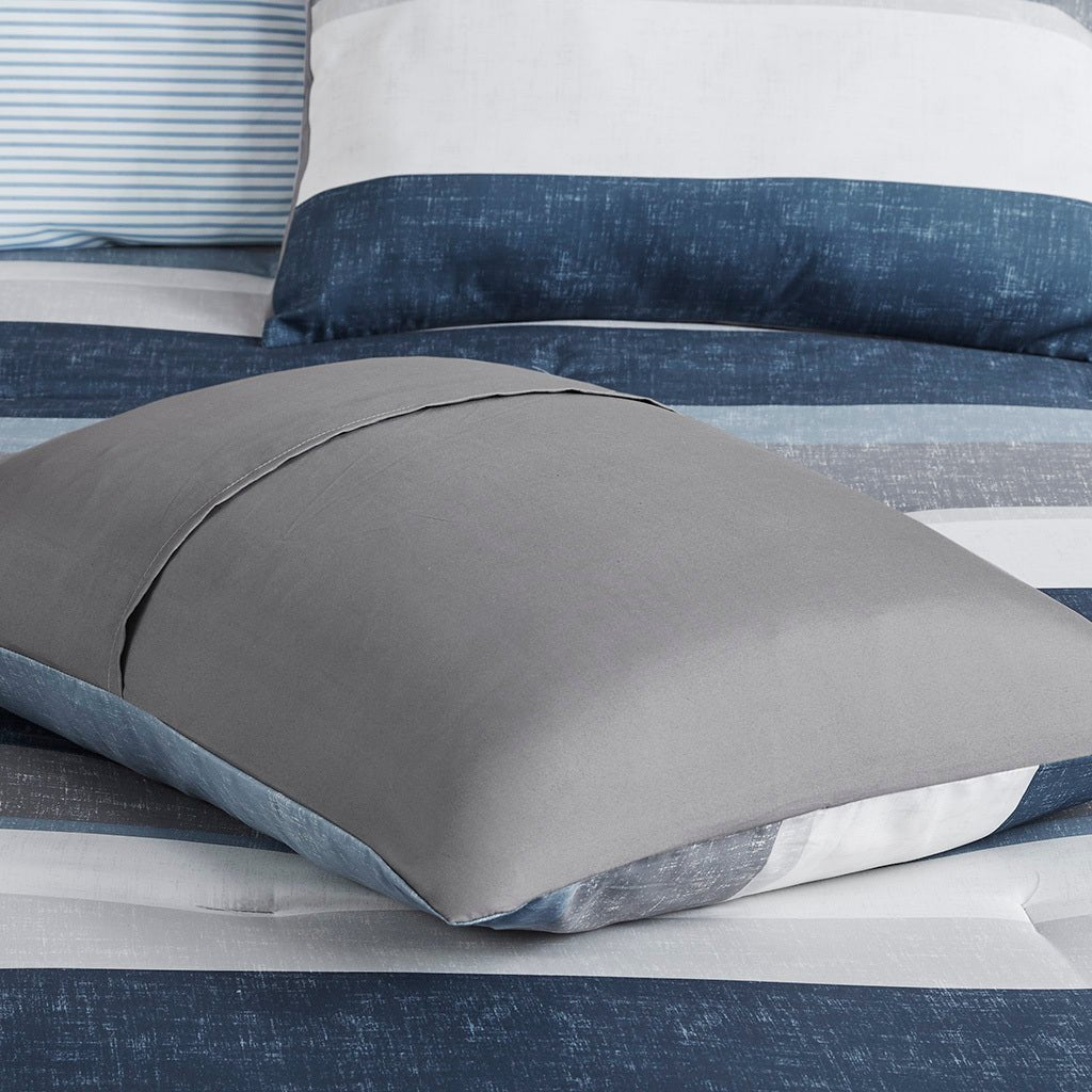 Anthony & Home Stripe Signature Collection microfiber comforter set with matching pillow shams on a neatly made bed.