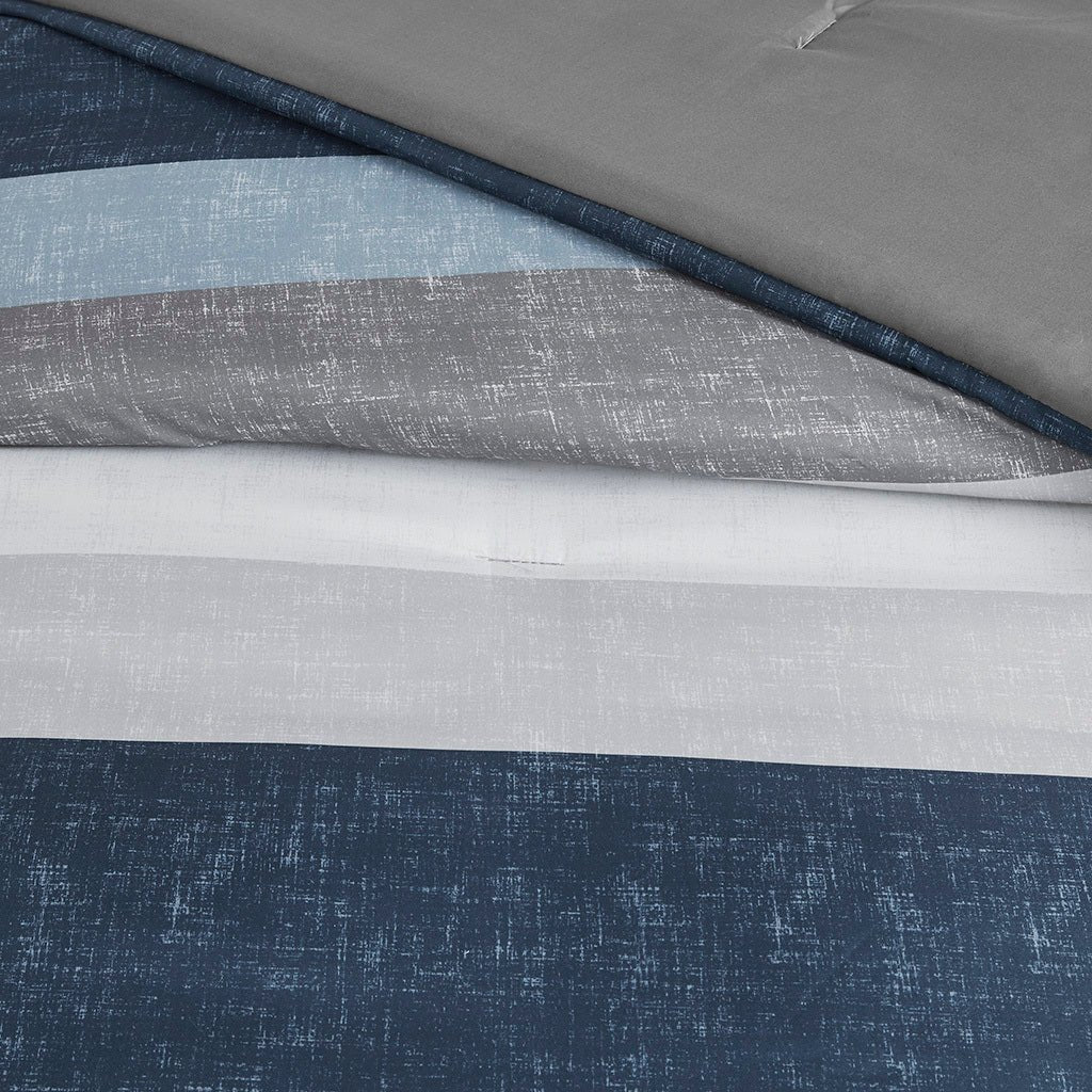 Anthony & Home Stripe Signature Collection microfiber comforter set with striped pattern on a neatly made bed.