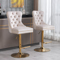 Beige velvet Anthony & Home bar stool with tufted seat and copper nailhead trim, limited edition, modern and stylish interior decor piece.