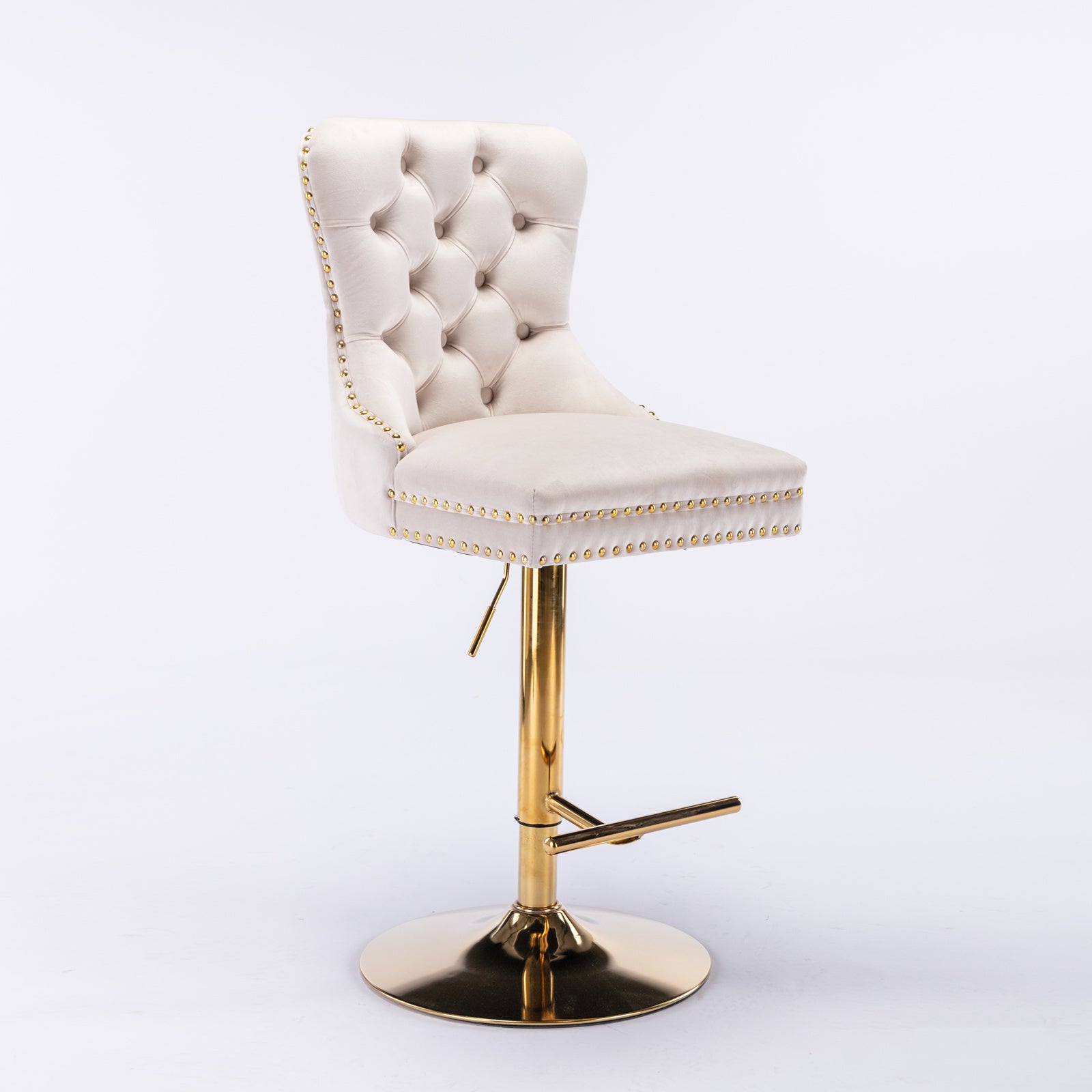 Beige velvet Anthony & Home bar stool with tufted seat, copper nailhead trim, and modern design.