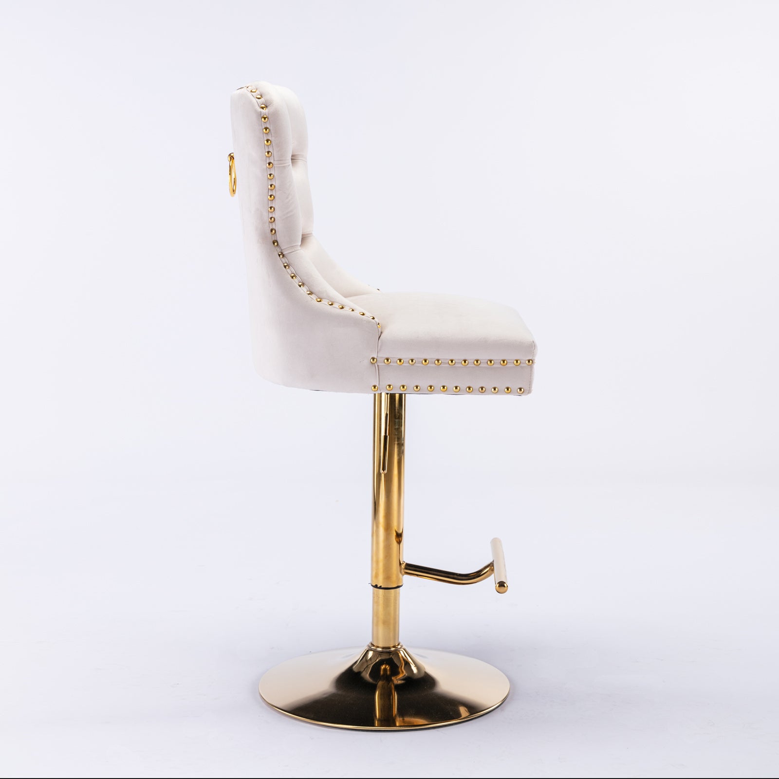Beige velvet tufted bar stools with copper nailhead trim by Anthony & Home, featuring a modern, limited edition design.