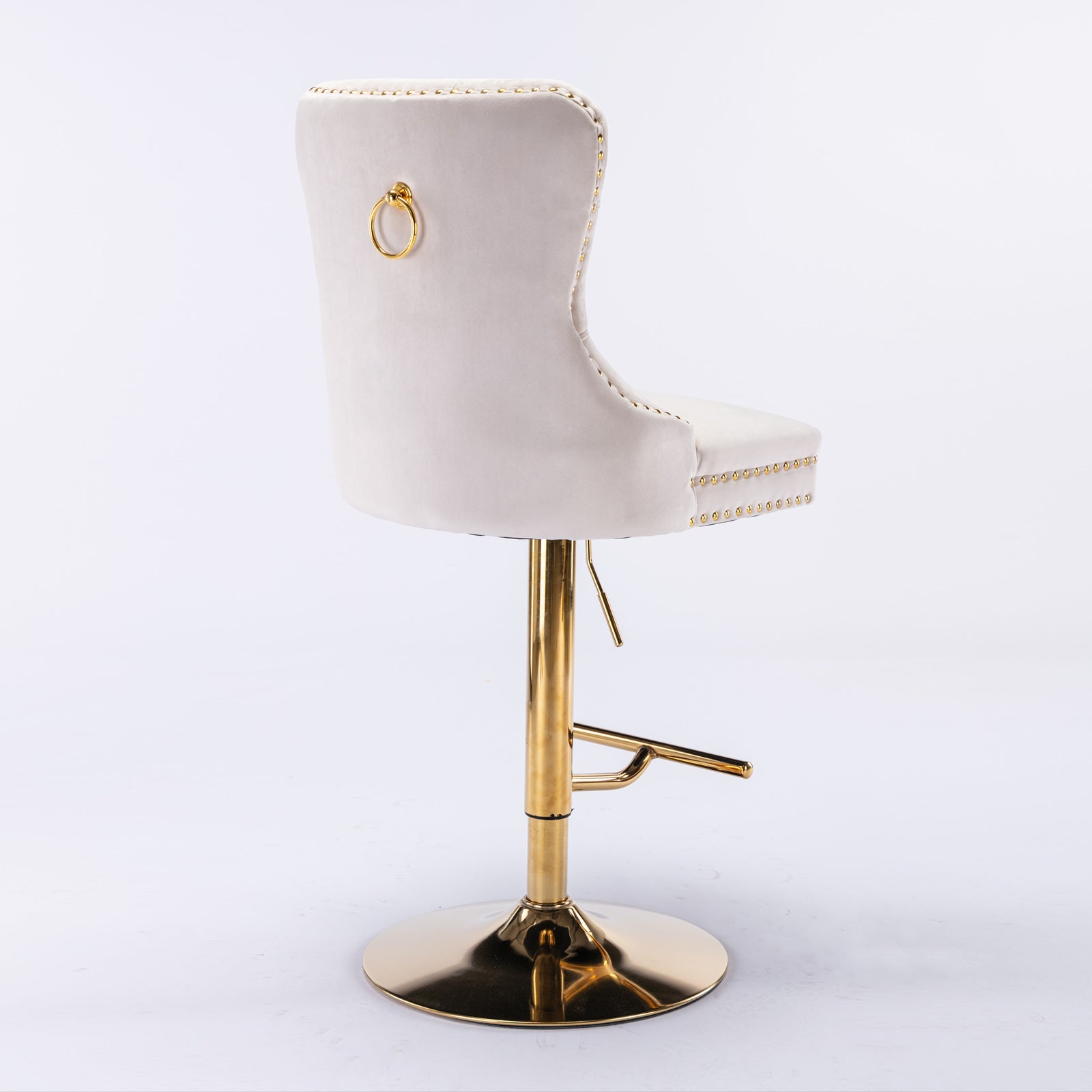 Anthony & Home beige velvet bar stools with tufted seats and copper nailhead trim, limited edition design.