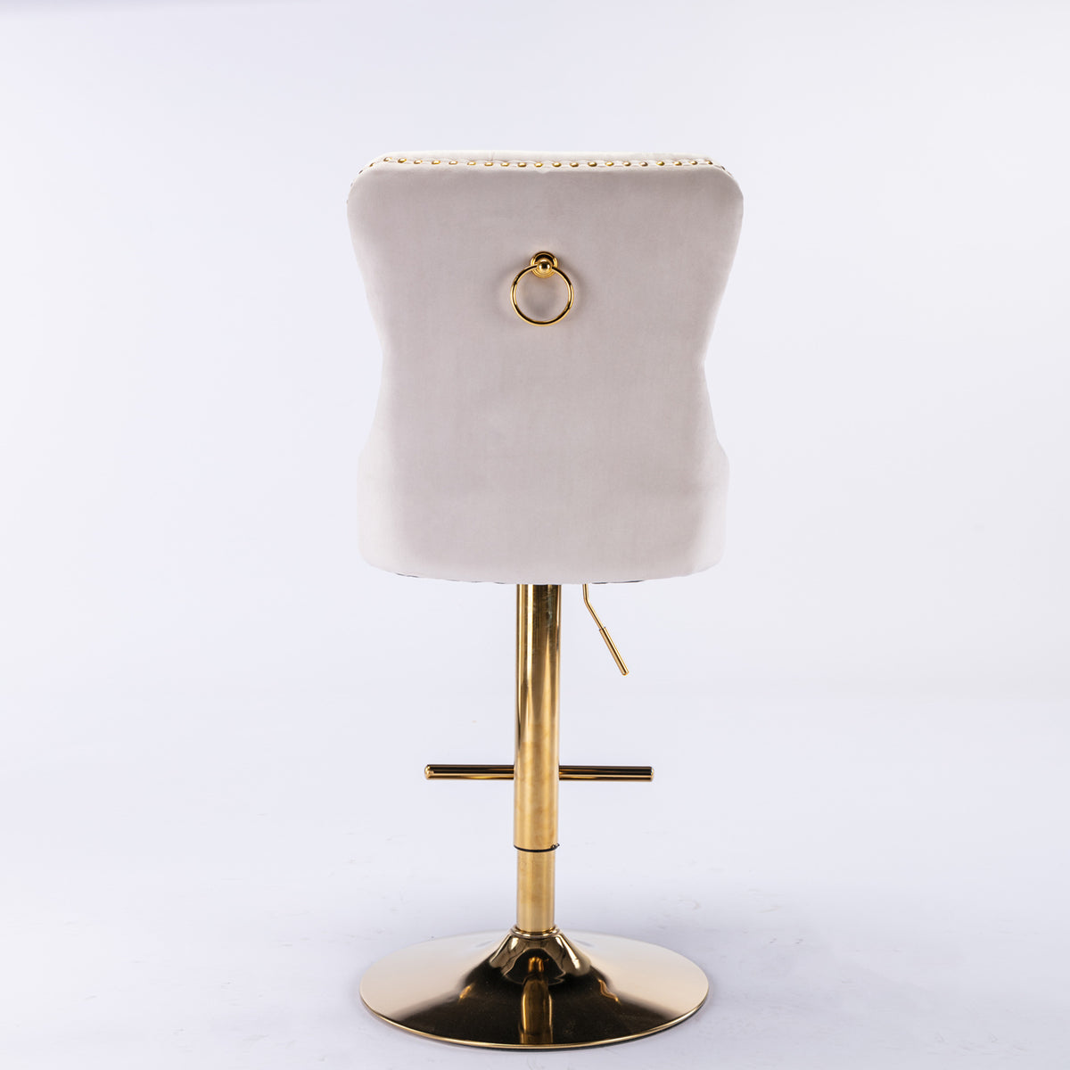 Beige velvet Anthony & Home bar stool with tufted cushion and copper nailhead trim, limited edition, modern kitchen seating.
