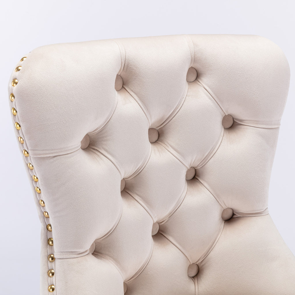 Beige velvet Anthony & Home bar stools with tufted seats and copper nailhead trim, showcasing a stylish and limited edition design.