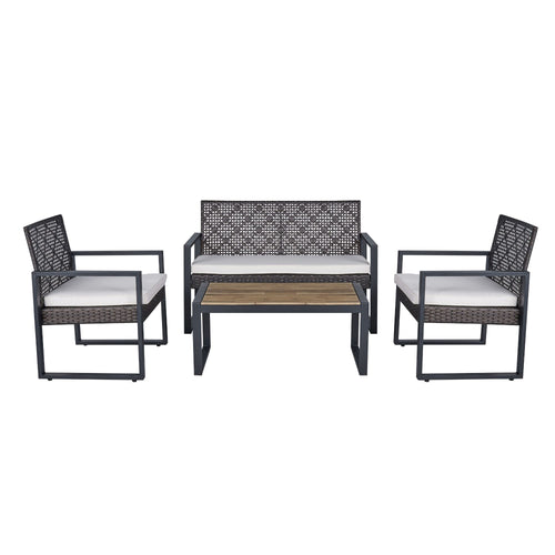 Acacia wood patio table with wicker frame and beige cushions, outdoor furniture set by Anthony & Home.