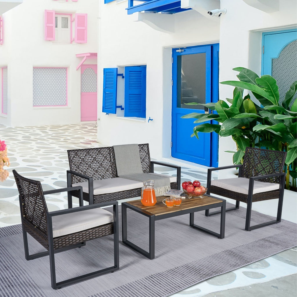 Anthony & Home Acacia wood patio set with wicker frame and beige cushions, outdoor furniture for relaxing outdoor spaces.