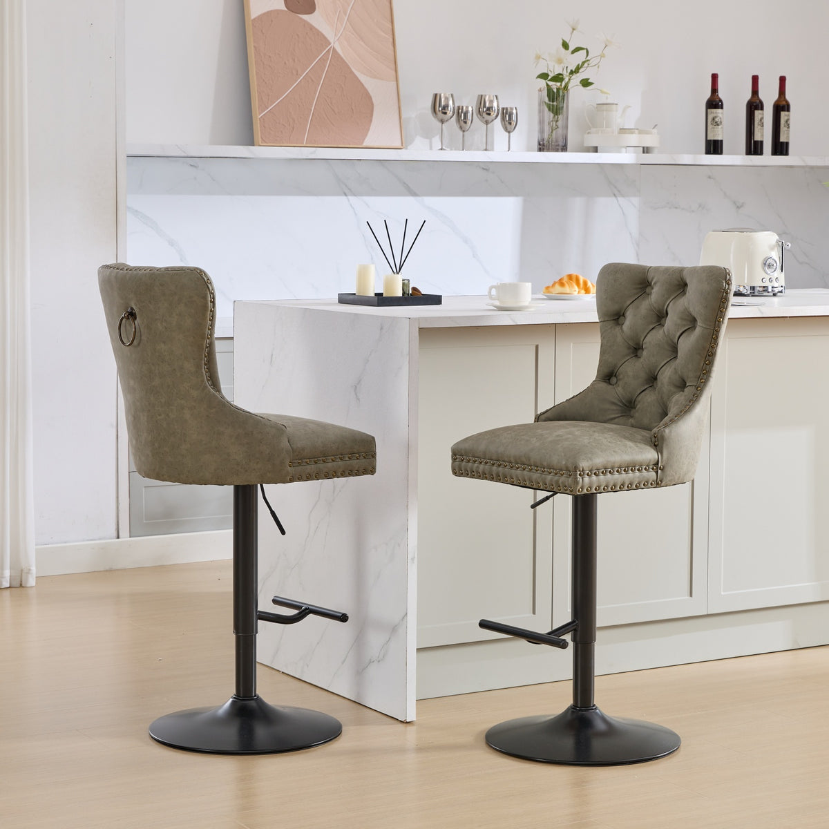 Set of two aged retro PU leather bar stools by Anthony & Home with metal legs, vintage style and cushioned seats.