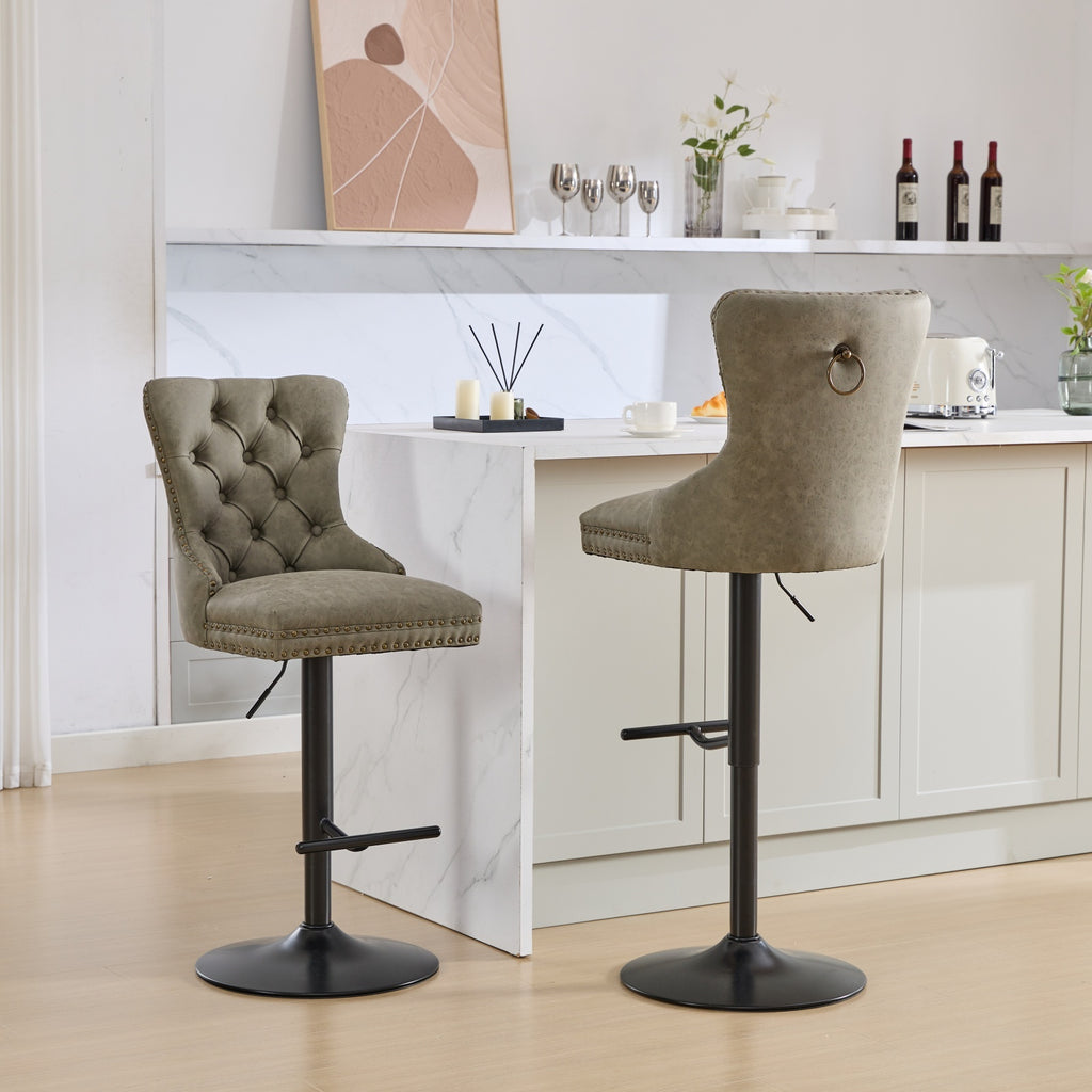 Pair of aged retro PU leather bar stools from Anthony & Home, vintage-style seating with metal legs in a set of two.