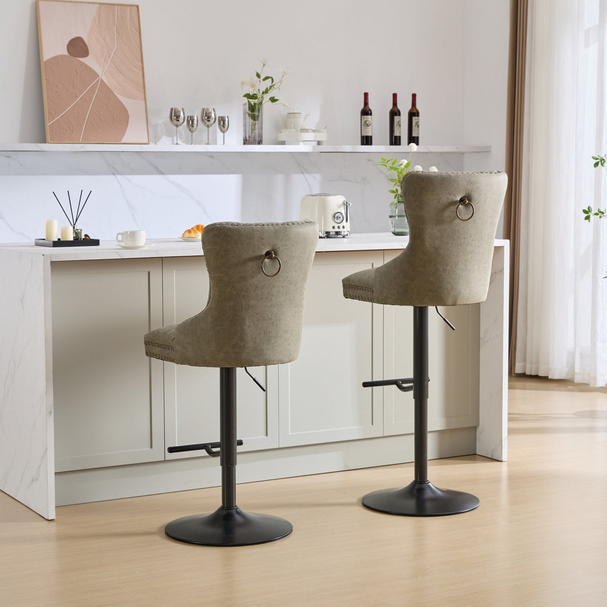Pair of aged retro PU leather bar stools by Anthony & Home, vintage-style seating with wooden legs and metal footrests.
